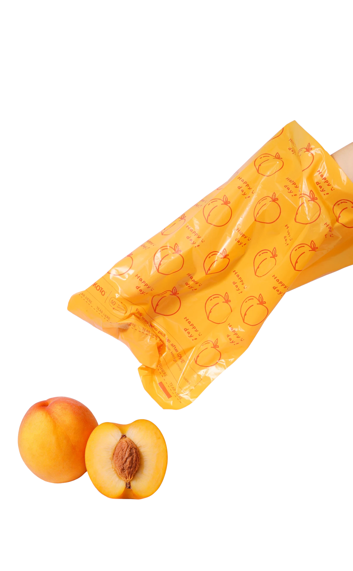 A filled bag, beside the peach it's named for