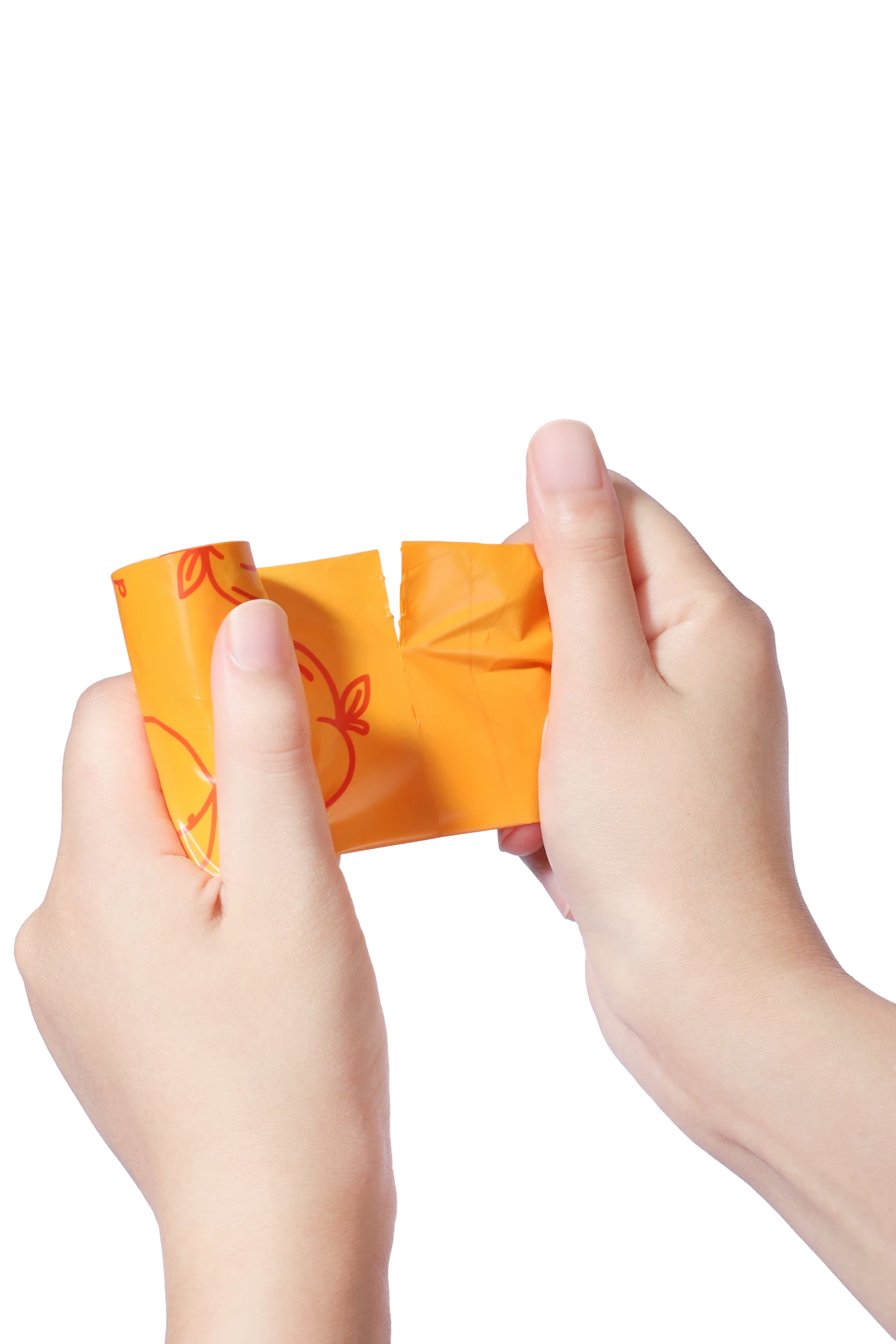 Tearing a bag off the roll